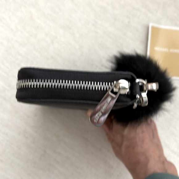 Michael Kors Wristlet. Black/Silver. Excellent Condition. MK fur key chain. - Picture 8 of 8